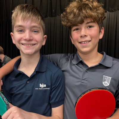 Students playing ping pong